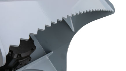 Baumalight DPH series PTO tree cutter with three-point hitch mounted on a New Holland tractor on white background