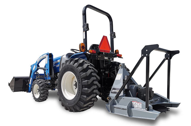 Baumalight DPH series PTO tree cutter with three-point hitch mounted on a New Holland tractor on white background