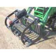 Haugen Attachments Rod Grapple for compact tractors and mini skid steers for grabbing brush roots and debris during land clearing