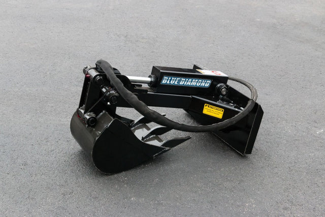 Blue Diamond mini skid steer backhoe attachment with hydraulic cylinder and toothed digging bucket on white background
