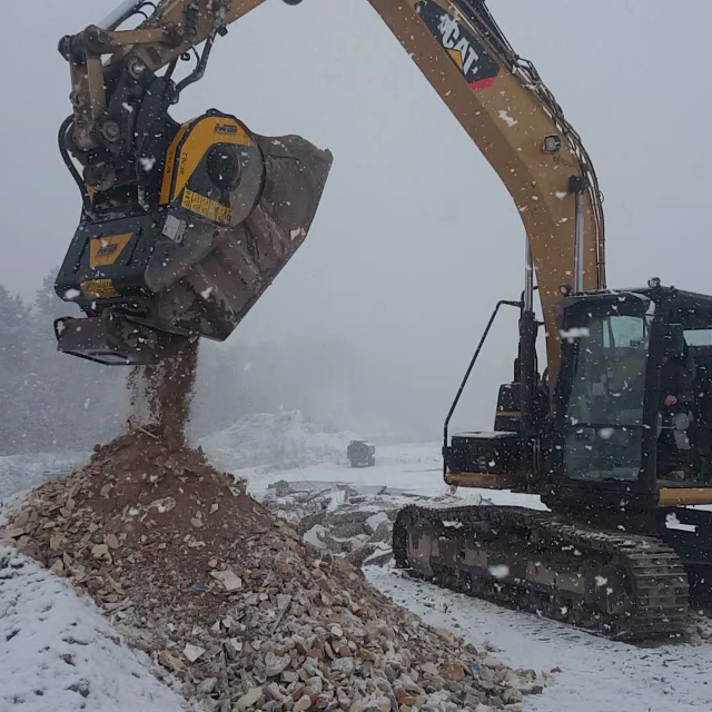 BF70.2 S4 Crusher Bucket Operating in Snowy Environment