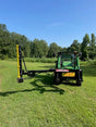 Limb Beaver BB4HP Baby Beaver brush cutter with yellow sickle bar mounted on a John Deere tractor in an open field