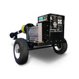 A Baumalight TX31 - 31 kW Tractor PTO Generator with black color, featuring a PTO shaft, trailer, and control panel on board.