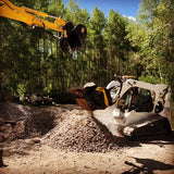 Bobcat-T300 Excavator operating on a construction site with trees in the background