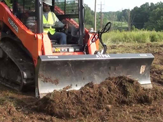 Paladin 6-Way Dozer Blade for skid steers with hydraulic angle and tilt control for precision grading and material pushing