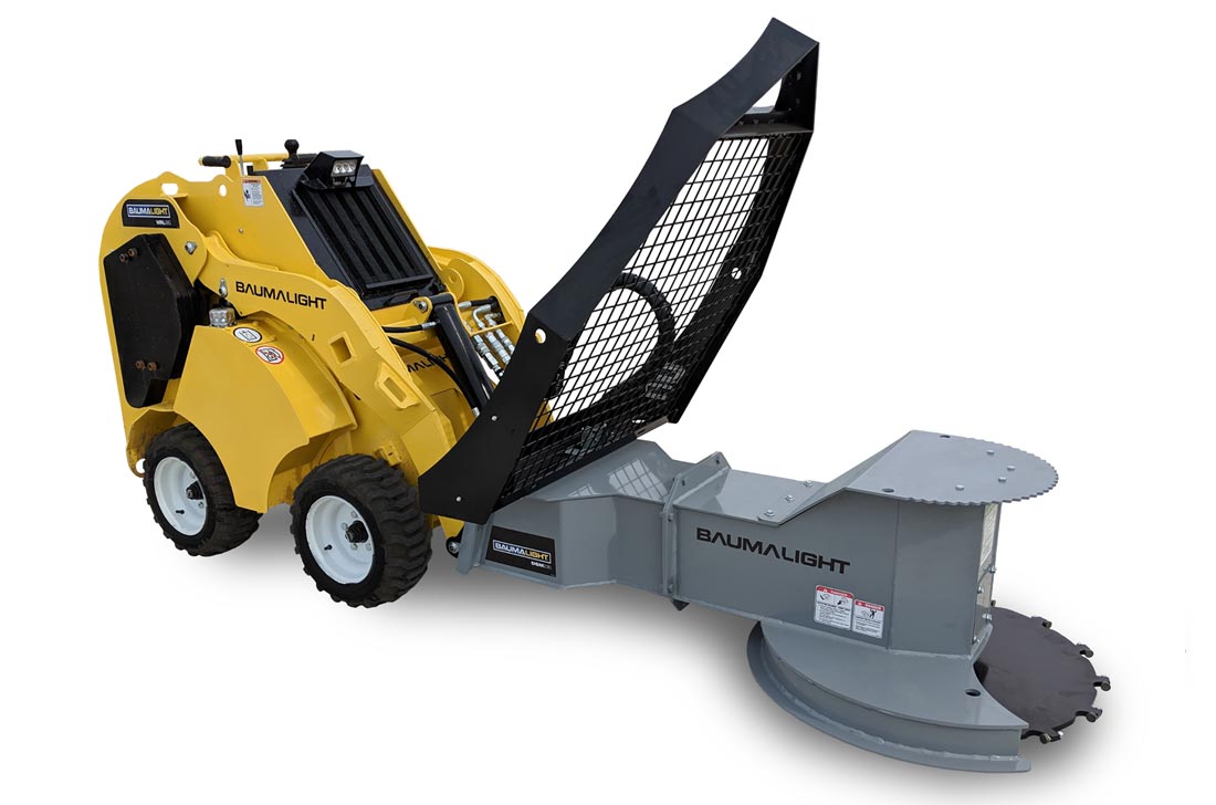 Horizontal tree saw attachment on a mini skid steer.