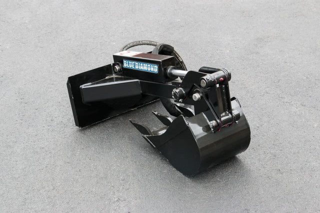 Blue Diamond mini skid steer backhoe attachment with hydraulic cylinder and toothed digging bucket on white background