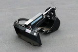 Blue Diamond mini skid steer backhoe attachment with hydraulic cylinder and toothed digging bucket on white background