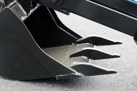 Blue Diamond mini skid steer backhoe attachment with hydraulic cylinder and toothed digging bucket on white background