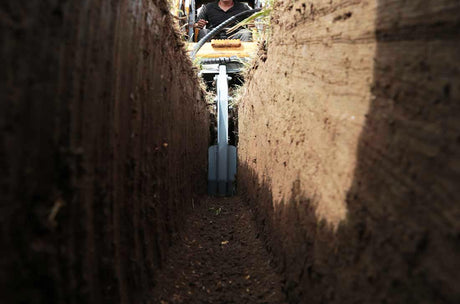 Baumalight TN760 High Flow Trencher for skid steers designed for digging utility trenches and drainage lines efficiently