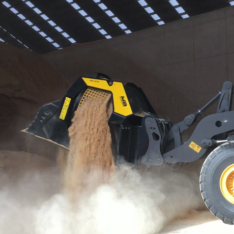 Volvo-L110H loader lifting sand