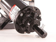 Close-up of a mechanical component with a brand label on a white background