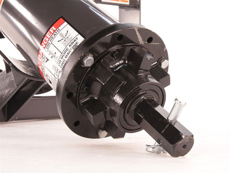 Close-up of a mechanical component with a brand label on a white background