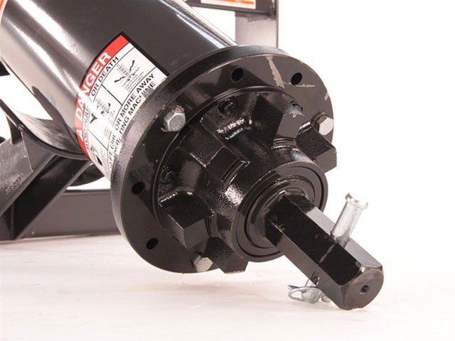 Close-up of a mechanical component with a brand label on a white background
