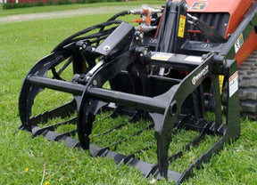 Paladin / FFC Brush Grapples for Skid Steer | A set of black FFC brush grapples for skid steer loaders, featuring multiple grapple pins and cylinders.