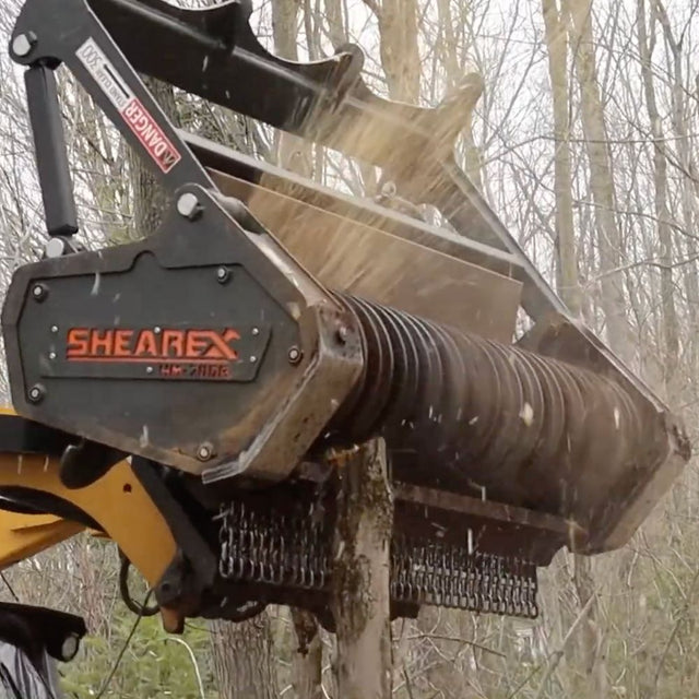 Shearex HM-Series Skid Steer Mulching Head for grinding brush trees and stumps into fine mulch during land clearing operations