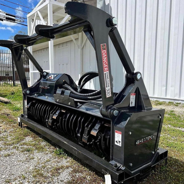 Shearex HM-Series Skid Steer Mulching Head for grinding brush trees and stumps into fine mulch during land clearing operations